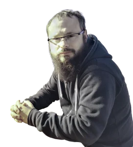 Maciej Mącidym, Projektant graficzny 3d, właściciel strony 3d.macvision.pl. kadr 3/4 z wyciętym tłem, obrysowany zielonym okręgiem. Mężczyzna w okularach, z długim zarostem.
